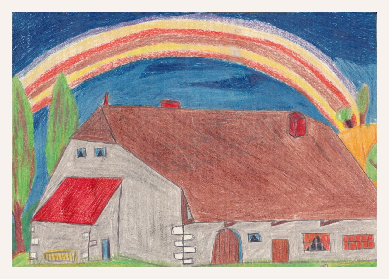 Arc en ciel au dessus d'une maison réalisé par un enfant